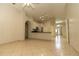 Open floor plan blending kitchen and living area, perfect for entertaining guests at 11547 Grazeley Ct, Orlando, FL 32837