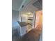 Efficient kitchen boasts white cabinets, breakfast bar, and open layout for easy meal prep at 131 Water Front Way # 110, Altamonte Springs, FL 32701