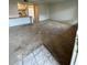 Spacious living room with carpeted floors, an open floorplan and access to kitchen at 131 Water Front Way # 110, Altamonte Springs, FL 32701