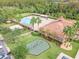 Community clubhouse featuring a pool, playground, and recreation area, great for Gathering fun at 14137 Queenside St, Orlando, FL 32824