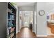 Bright foyer with tile flooring, a decorative bookshelf, and ample natural light streaming in at 14137 Queenside St, Orlando, FL 32824