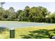Outdoor basketball court featuring well-maintained surfaces and lush green surroundings for recreational enjoyment at 14262 Tanja King Blvd, Orlando, FL 32828
