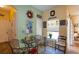 Cozy breakfast nook with a decorative wall, window, and comfortable seating area at 14262 Tanja King Blvd, Orlando, FL 32828