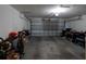 Spacious garage with ample storage and an automatic door, offering convenience and organization at 14262 Tanja King Blvd, Orlando, FL 32828