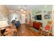 Inviting living room with hardwood floors and comfortable seating, bathed in warm, natural light at 14262 Tanja King Blvd, Orlando, FL 32828