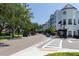 Vibrant town center with tree-lined streets and sidewalks, offering a walkable urban experience near shopping and dining at 14262 Tanja King Blvd, Orlando, FL 32828