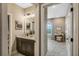 Elegant bathroom featuring a modern vanity with double sinks, stylish fixtures, and contemporary decor at 15201 Summer Harvest St, Winter Garden, FL 34787