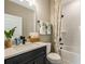 Well-lit bathroom featuring a shower and tub combination with a modern vanity and stylish fixtures at 15201 Summer Harvest St, Winter Garden, FL 34787