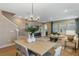 Warm and inviting living room offering a relaxing atmosphere and seamless flow into other living spaces at 15201 Summer Harvest St, Winter Garden, FL 34787