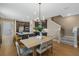 Open-concept layout seamlessly connects the kitchen, dining, and living areas, enhancing everyday living at 15201 Summer Harvest St, Winter Garden, FL 34787
