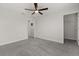 Light bedroom with doorways leading to other rooms and a ceiling fan at 16124 Azure Key St, Winter Garden, FL 34787