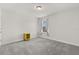 Clean bedroom featuring neutral carpet and a bright window at 16124 Azure Key St, Winter Garden, FL 34787