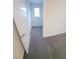 Empty walk-in closet with neutral gray carpet at 16124 Azure Key St, Winter Garden, FL 34787