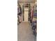 Spacious walk-in closet with custom shelving and ample storage space at 16124 Azure Key St, Winter Garden, FL 34787