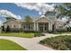 Community clubhouse featuring manicured landscaping and accessible entrance at 16124 Azure Key St, Winter Garden, FL 34787