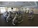 Onsite gym includes cardio machines, weights, and weight machines for residents at 16124 Azure Key St, Winter Garden, FL 34787