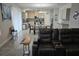 Cozy living space flowing into the kitchen and dining area at 16124 Azure Key St, Winter Garden, FL 34787