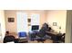 Home office featuring two desks, a computer, and ample natural light from the windows at 16124 Azure Key St, Winter Garden, FL 34787