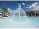 Community splash pad with a central fountain for Gathering fun and relaxation at 16124 Azure Key St, Winter Garden, FL 34787