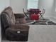 Upstairs recreation room with recliner seating, game table, and neutral carpeting at 16124 Azure Key St, Winter Garden, FL 34787