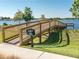 A wooden waterfront pier offering access and views of the adjacent lake at 16124 Azure Key St, Winter Garden, FL 34787