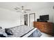 Bedroom featuring a ceiling fan and furniture at 18906 Merrich Rd, Orlando, FL 32820