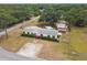 Beautiful property showcases a well-kept yard, RV parking, and a home with striking red shutters at 18906 Merrich Rd, Orlando, FL 32820