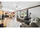 Spacious living room seamlessly connects to the kitchen and dining area, perfect for gatherings at 18906 Merrich Rd, Orlando, FL 32820