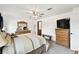 Comfortable main bedroom with natural wood furniture, offering a relaxing and inviting space at 18906 Merrich Rd, Orlando, FL 32820