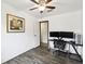 Efficient office area with dual monitors, task chair, and stylish wood-look flooring at 18906 Merrich Rd, Orlando, FL 32820