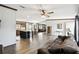 Spacious open concept layout connecting the living room, kitchen, and dining areas at 18906 Merrich Rd, Orlando, FL 32820