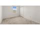 Empty bedroom with closet and window at 2294 Canyon Breeze Ave Ave, Kissimmee, FL 34746