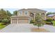 Stunning two-story home with a three-car garage and paver driveway at 2365 Sterling Creek Pkwy, Oviedo, FL 32766