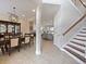 Open-concept foyer with dining area, stairway and living room at 2365 Sterling Creek Pkwy, Oviedo, FL 32766