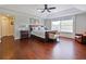 Elegant main bedroom featuring hardwood floors, large window, and neutral color palette at 2365 Sterling Creek Pkwy, Oviedo, FL 32766