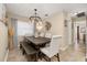 Contemporary dining room with rustic table and decorative lighting, bench seating available at 241 Lake Thomas Dr, Winter Haven, FL 33880