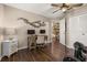 Home office featuring hardwood floors, neutral paint, and bright natural light at 241 Lake Thomas Dr, Winter Haven, FL 33880
