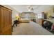 Spacious bedroom featuring ceiling fan, exercise equipment, and natural light at 2787 Cypress Head Trl, Oviedo, FL 32765
