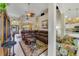 Open-concept living area with vaulted ceilings, tile floors, and comfortable seating at 2787 Cypress Head Trl, Oviedo, FL 32765