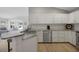 Modern kitchen with stainless steel appliances and granite countertops at 3018 Andover Ct, Mount Dora, FL 32757