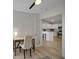 Office space with view into kitchen, featuring a desk, chair, and decor at 3018 Andover Ct, Mount Dora, FL 32757