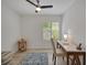 Office space with desk, chair, side table, and window with shutter blinds at 3018 Andover Ct, Mount Dora, FL 32757