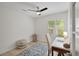 Office with desk, chair, area rug, and window with shutter blinds at 3018 Andover Ct, Mount Dora, FL 32757