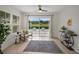 Sunroom with furniture, large sliding glass doors, and a view to the outdoors at 3018 Andover Ct, Mount Dora, FL 32757
