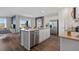 Well-lit kitchen featuring stainless steel appliances, modern fixtures, and an open layout at 3121 Partington Blvd, Davenport, FL 33837