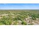 Aerial view of home surrounded by mature trees and landscaping providing privacy at 368 E Chelsea St, Deland, FL 32724