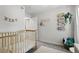 Bright Bedroom featuring a crib, closet, and decorated reading corner for enjoyment at 368 E Chelsea St, Deland, FL 32724