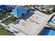 Overhead shot of a sandy volleyball court with people playing volleyball at 3806 Lana Ave, Davenport, FL 33897