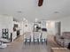 Bright, open kitchen featuring a large island with seating and modern appliances at 4743 Sw 114Th Pl, Ocala, FL 34476