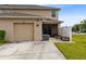 Two-story home with attached one-car garage and screened in patio at 4801 Apple Blossom Ln, St Cloud, FL 34771